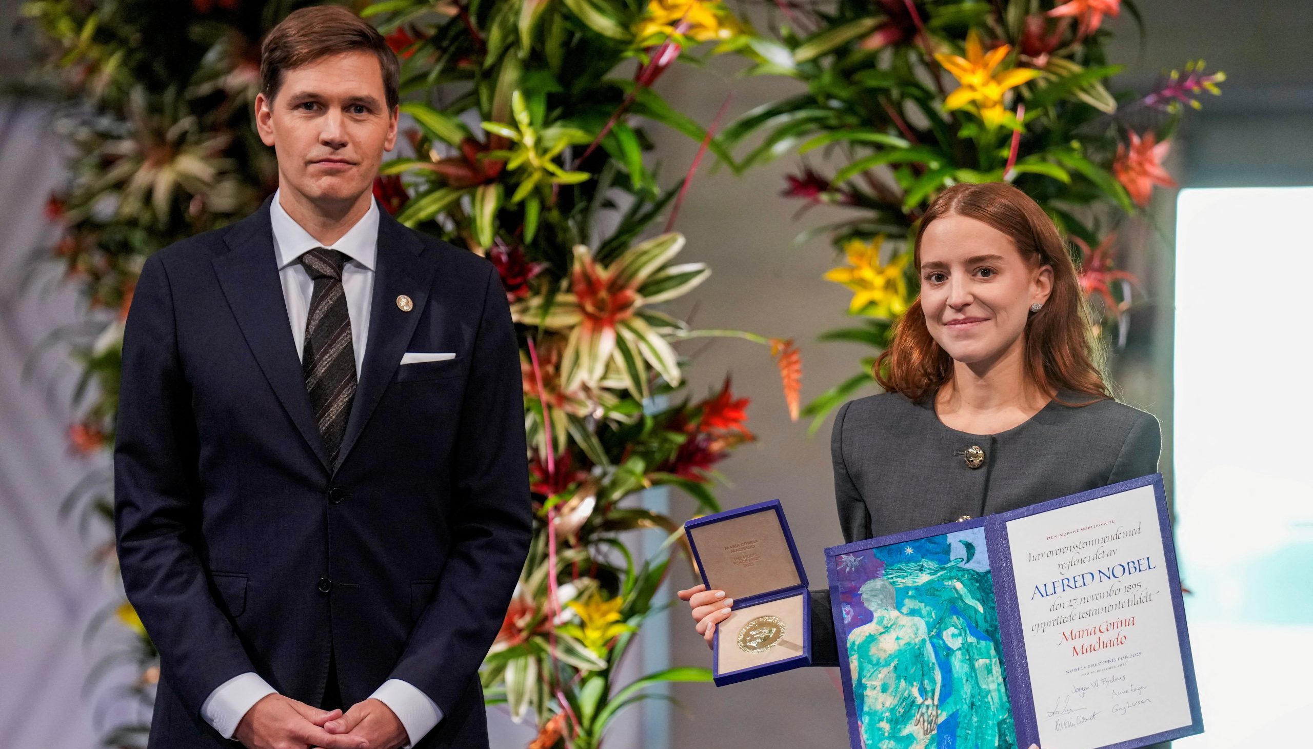 Jørgen Watne Frydnes, Chair of the Norwegian Nobel Committee and Ana Corina Sosa Machado, daughter of Maria Corina Machado.